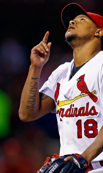 Martinez pitches a gem, Holliday hits emotional home run